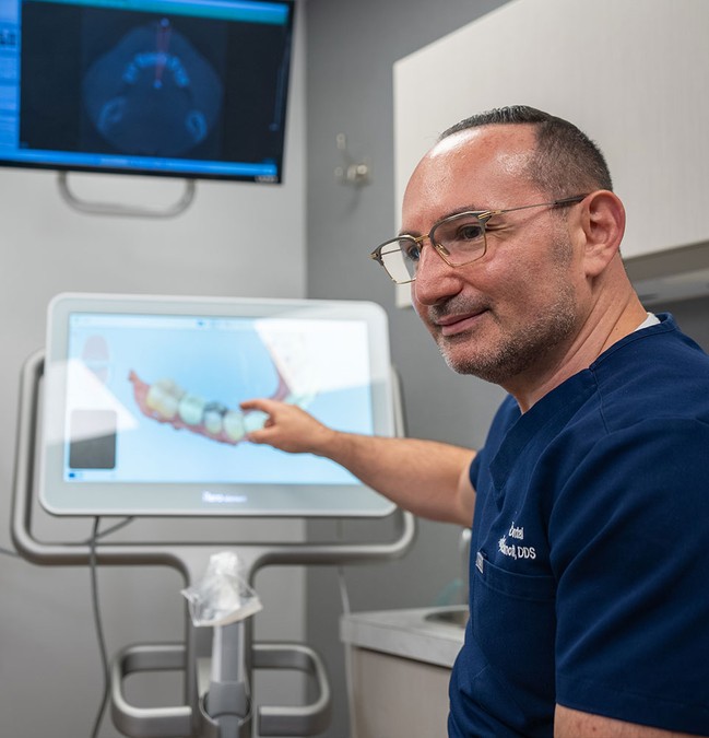 doctor showing information on the screen