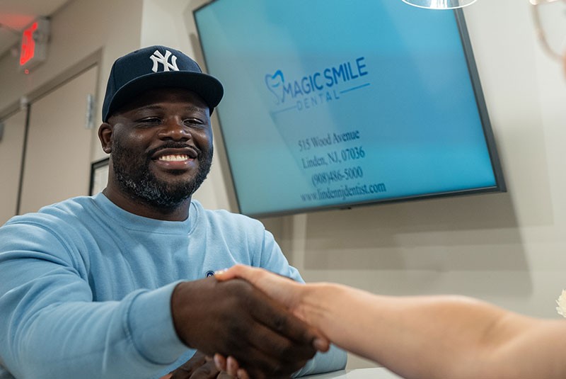 doctor shaking hands with a patient