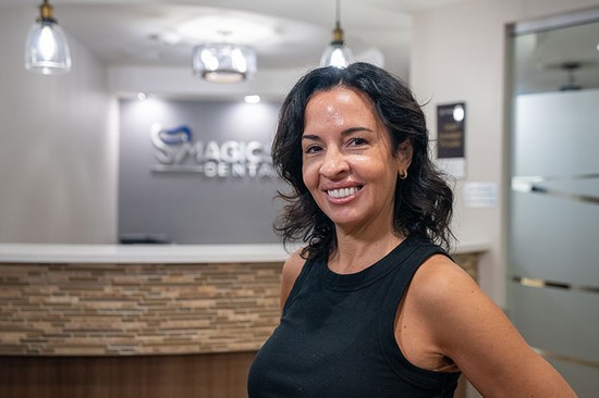 patient standing in a dental office