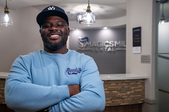 patient standing in a dental office