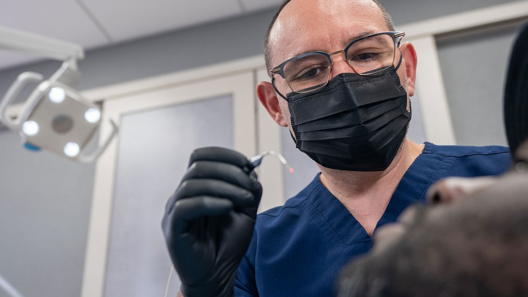 doctor treating a patient