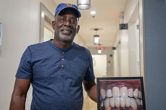 patient standing in a dental office